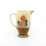 Clarice Cliff: A Clarice Cliff Crocus pattern jug. Height approx 16cm. Marks to the base.