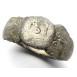 Roman silver ToT ring.  A silver finger ring having flared sub-triangular shoulders with ring-and-