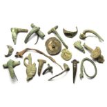 Roman Artefacts.  Circa, 1st-4th century AD. An interesting group of artefacts, mostly brooches of