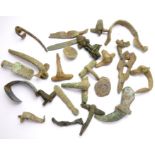 Roman Artefacts Group.  A selection of pieces including, various brooch types, cosmetic tools, knife