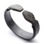 Roman Snake Ring. A silver penannular finger ring detailed with stylised snake headed terminals