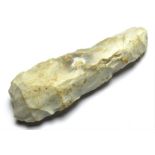 Neolithic Adze.   Circa, 4000 BC-2350 BC. Stone, 143.08 mm, 43.75 mm. A white flint axe found on the