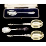 A George V silver cased spoon, Sheffield, 1922, 0.94 ozt together with a pair of Elkington & Co