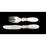 **REOFFER JANUARY A&C £60-80**  A matched Georg Jensen silver cactus pattern child's knife and fork,