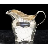 **REOFFER JANUARY A&C £30-40**  A George III silver helmet shaped cream jug, bright-cut engraved