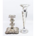 A late Victorian silver dwarf candlesticks, shaped square detachable nozzle above urn shape scone,