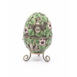 A Russian silver, silver gilt and enamel Egg, the body with applied bees above flowers and