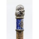 An early 20th Century Russian silver, lapis lazuli and gilt metal mounted walking cane, style of