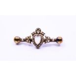 A late Victorian moonstone, pearl and diamond brooch with heart-shape moonstone to the centre within