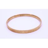 9ct gold slave bangle. weight:10.84g approx, diameter: 7.5cm approx.