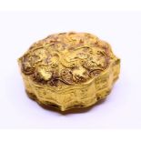 A Gold Chinese Zodiac box, Liao Dynasty decorated with Lions, rabbits , rats within a leaf ground