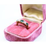 An 18ct Edwardian diamond and emerald ring, weight 4.04g approx.  size: (K)