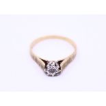 A 9ct gold textured diamond solitaire ring 3g