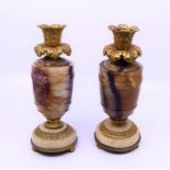 A fine pair of Regency ORMOLU mounted Blue John candlesticks