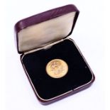 An Elizabeth II gold sovereign, dated 1966 in case