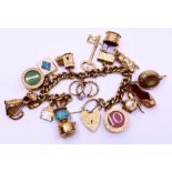 A 9ct gold charm bracelet total gross 66g