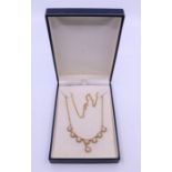 A gold and Opal necklace, weight: 9.31g