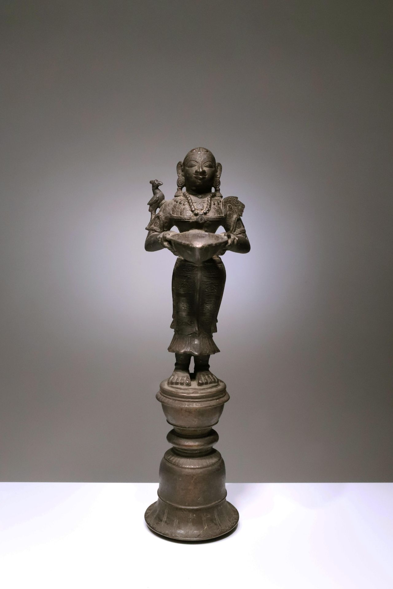 STANDING GODDESS WITH PARROT