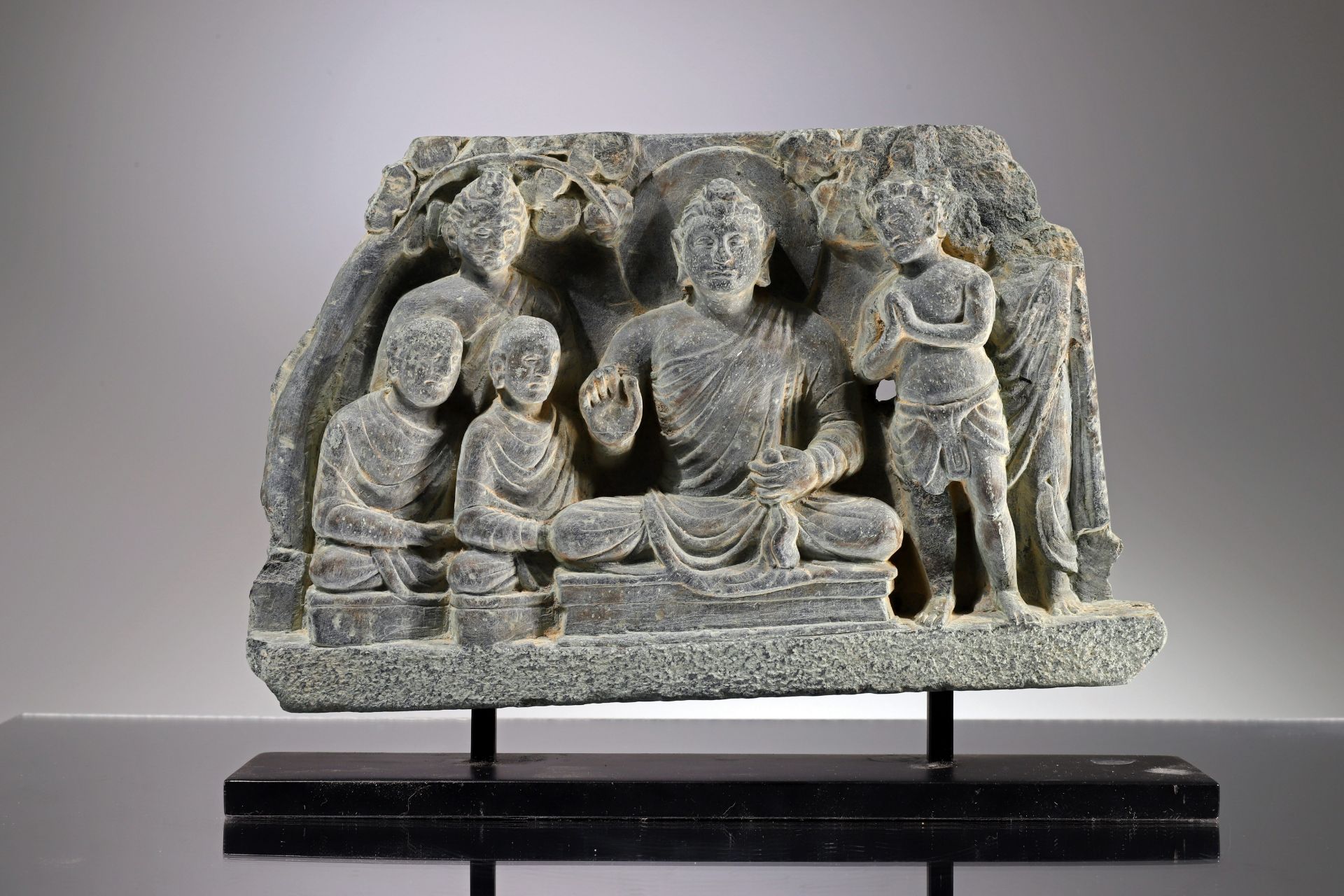 A RELIEF DEPICTING BUDDHA AND FOLLOWERS