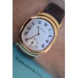 RARE 18K GOLD TIFFANY & CO. "TONNEAU" DUAL-TIME GENTS WRISTWATCH (WITH £9,000 VALUATION)