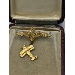 UNUSUAL GOLD COLOURED RAF BADGE WITH BI PLANE ATTACHED