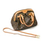 Louis Vuitton "Tivoli" GM handbag Monogrammed canvas and natural leather. Slight patina on the