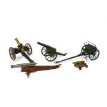 Set of antique scale models Three canons, a GATLING machine gun, and an attached munitions box. Wood