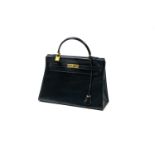 HERMES "Kelly", rigid 32 cm Rigid Kelly 32 handbag, likely black Russia leather, gilt brass
