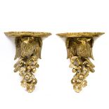 Pair of sideboard sconces 20TH CENTURY WORK Carved giltwood decorated with eagles. H : 43 cm Width :