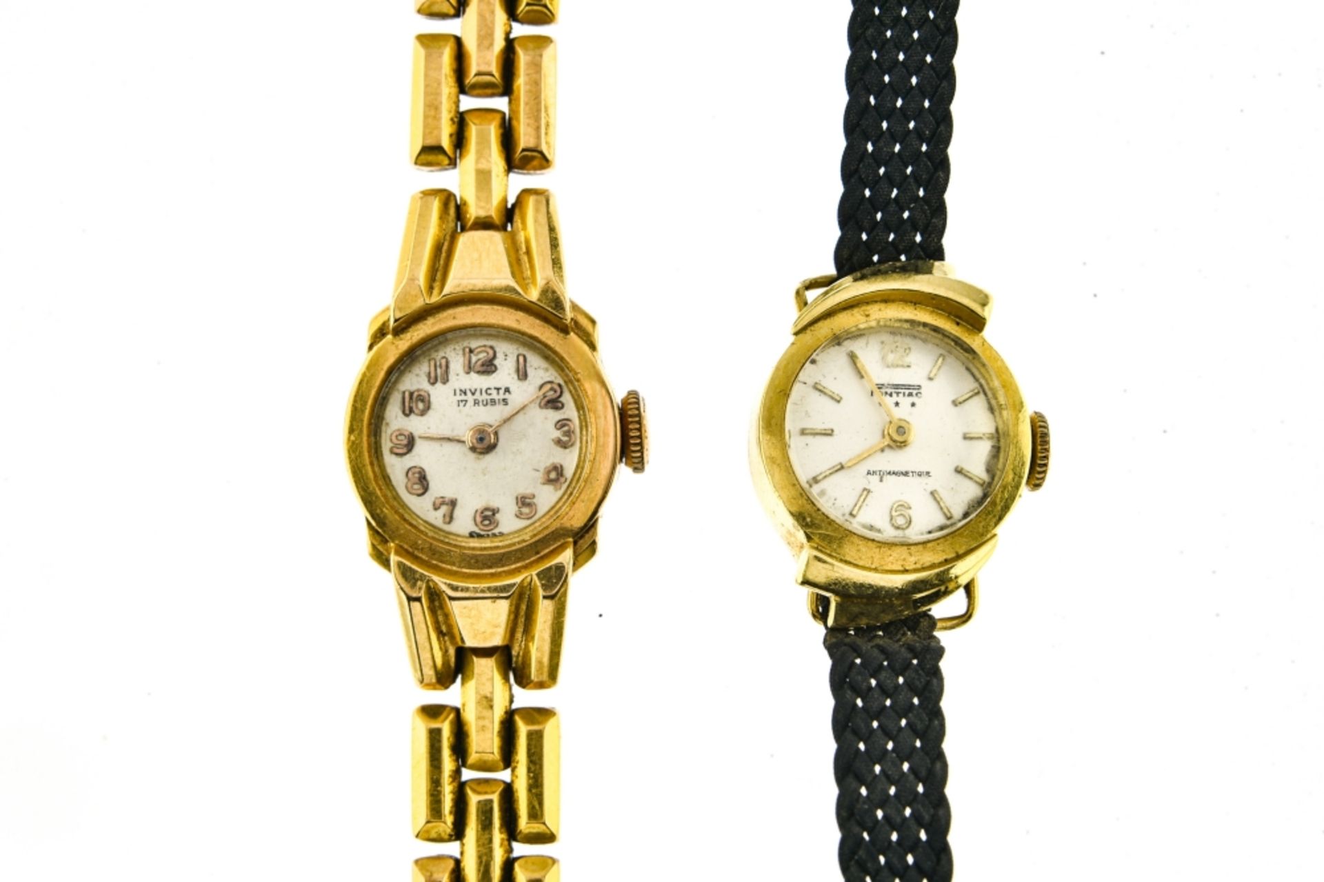 Pontiac Lot of 2 lady's bracelet watches 1. Lady's 18 kt gold Pontiac Silver-plated dial signed "