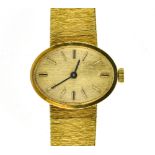 Vintage oval lady's watch SWITZERLAND 18 kt yellow gold bracelet watch Oval casing, horizontally-