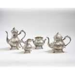 PUIFORCAT Coffee and tea set silver, composed of a teapot, a coffee pot, and a creamer. A German