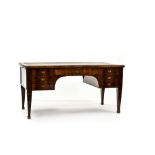 Large empire desk 19TH CENTURY WORK mahogany, with six drawers (one hidden) and brown and gilt