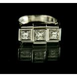 Trilogy tank ring Platinum, set with three brilliant-cut diamonds respectively weighing 0.30 ct