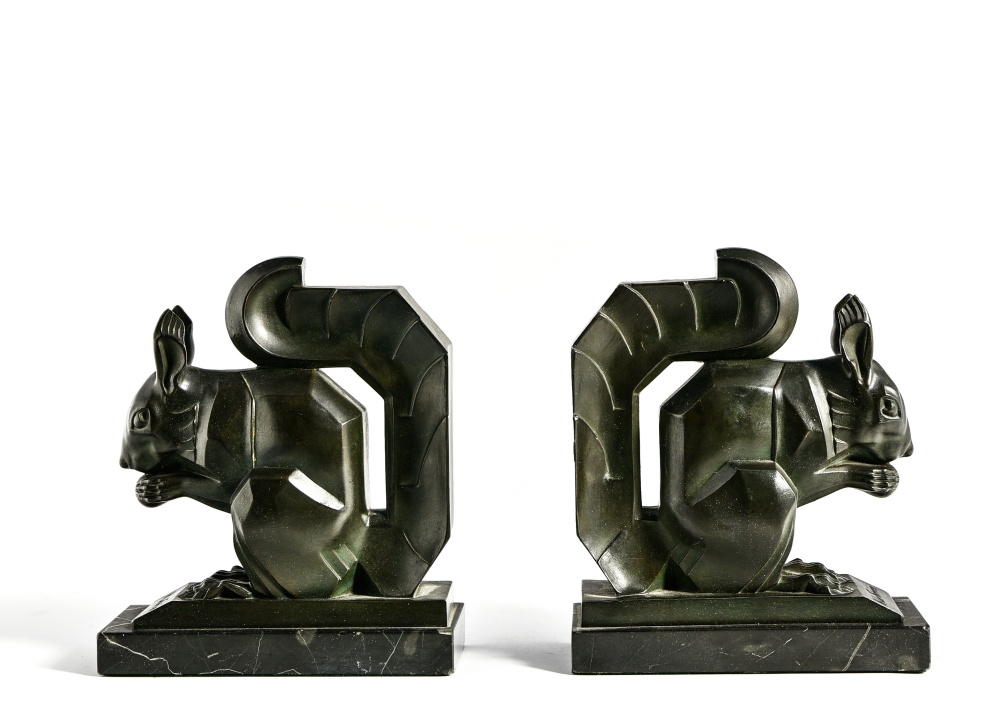 Max LEVERRIER (1891-1973) Pair of squirrel bookends bronze with green patina, black marble base with