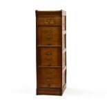 Office furniture EARLY 20TH CENTURY WORK Oak, with four drawers. H : 133 cm Width : 40 cm Depth : 59