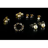 Lot of pearl jewellery Includes: a pair of 18 kt white gold stud earrings each set with a white