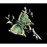 Butterfly brooch 18 kt yellow and white gold, set with five blue sapphires, four emeralds,