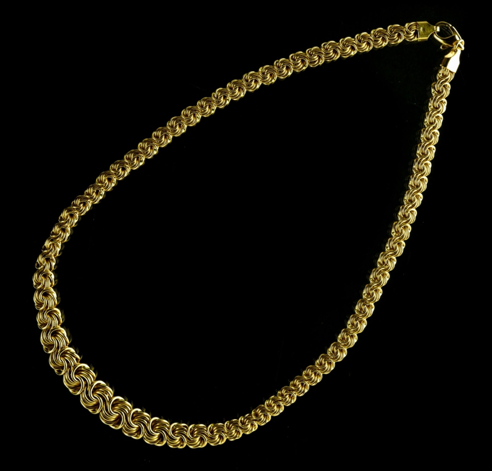 Flexible necklace 18 kt yellow gold, Byzantine chainmail enlarged in the centre. Eagle's head