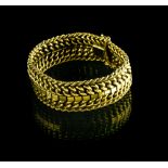 Articulated bracelet 18 kt yellow gold Three chain links need re-welding Width : 1,8 cm L : 18,5