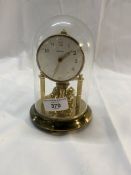 Clocks: 20th cent. Bentima anniversary clock with glass dome. Height 6½ins.