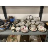 20th cent. Ceramics: E. Hughes & Co. Part tea set, white bordering purple 6 cups, 3 saucers, 7