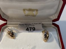 Jewellery: Cartier yellow, white and red 18ct gold hoop earrings. Pattern number F466 53. Weight