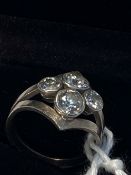 Jewellery: Diamond four stone ring. Four old brilliant cut diamonds, individually collar set in a