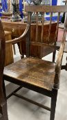 Late 18th cent. English oak elbow chair.