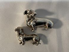 Hallmarked Silver: Miniature dachshunds, London marks, 1977 and 85. 2.95oz. (2)