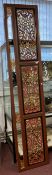 20th cent. Chinese horizontal red lacquer wall mounted panel with pierced gilt decoration. 95ins.