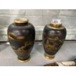 Ceramics: 20th cent. Japanese black ground kobe and peony vases. A pair. 7ins.