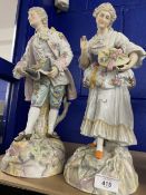 Late 19th early 20th cent. German figurines, man and woman picking flowers, multicoloured