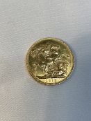 Coins: George V. 1912 gold sovereign.